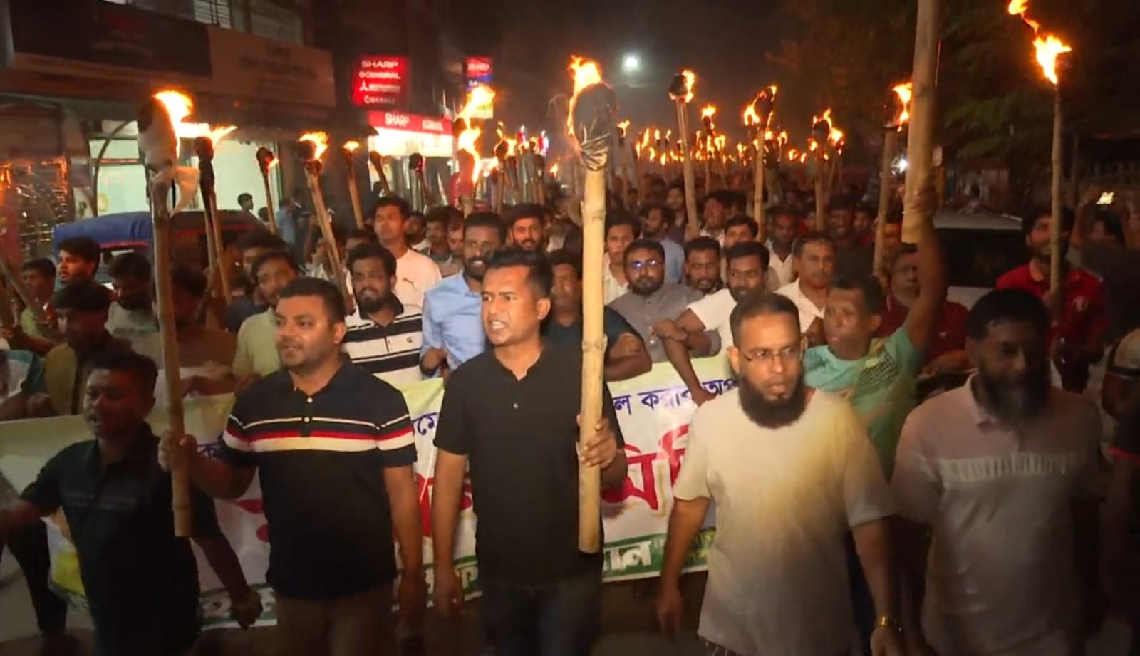 Torchlight Procession Held in Pabna Against Planned Terrorism