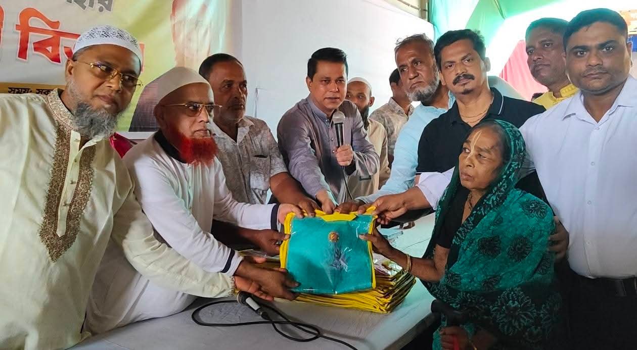 1,400 saris and lungis distributed among Hindu community members in Bhaluka for Durga Puja