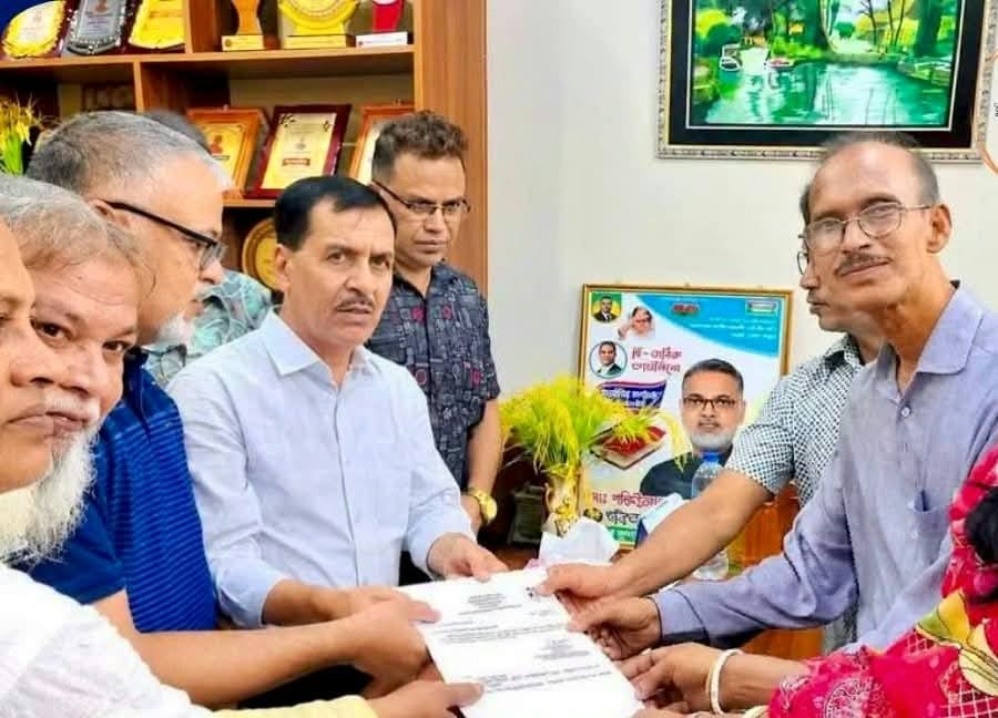 MP Dholu distributes financial aid checks to religious institutions in Naogaon Sadar