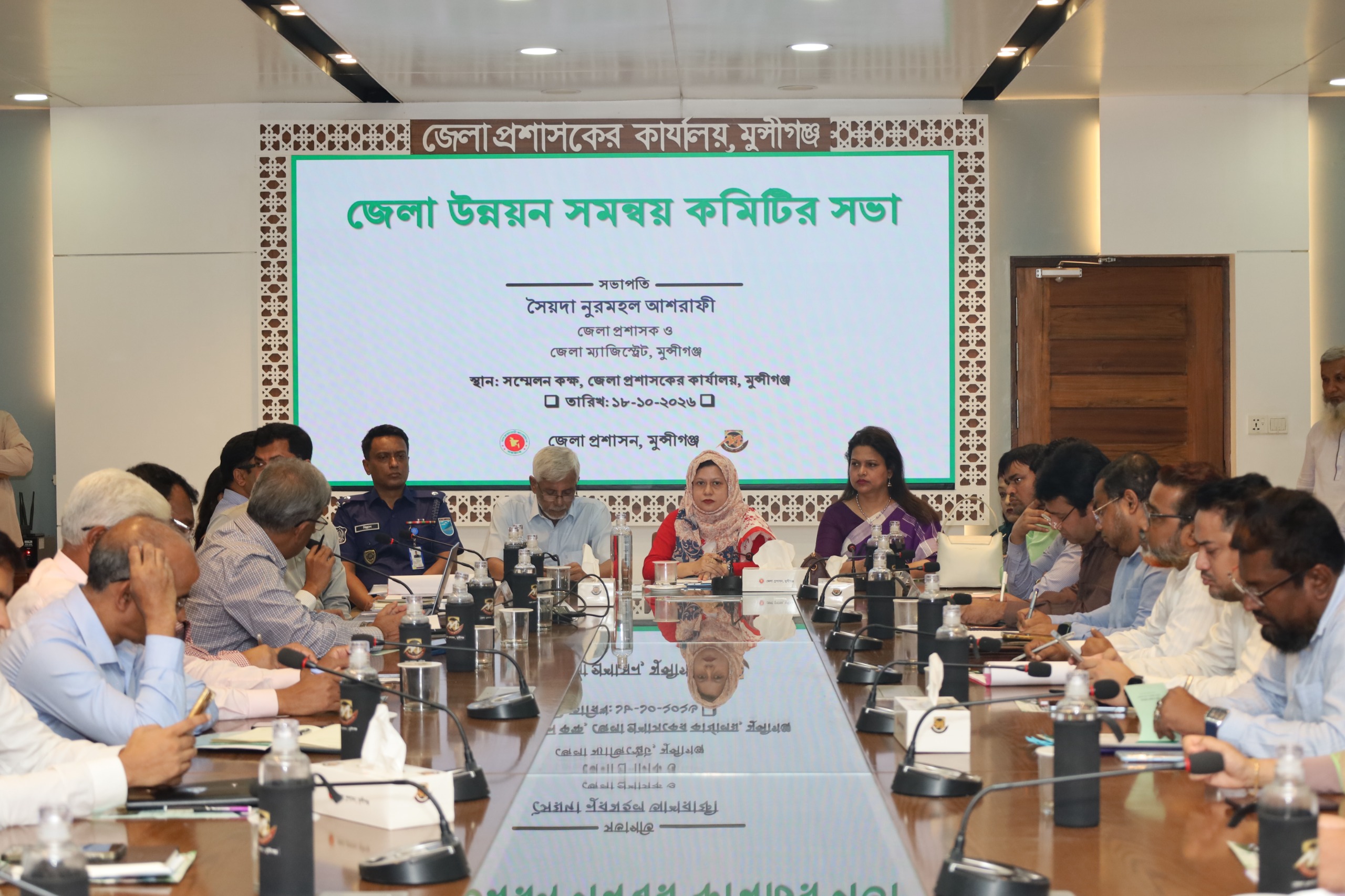 Munshiganj district development coordination committee meeting emphasizes timely project completion and dengue prevention