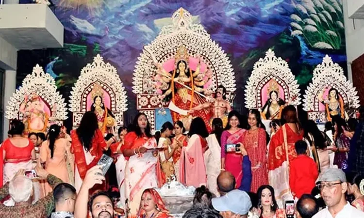 Bijoya Dashami being celebrated with traditional Sindur Khela at mandaps